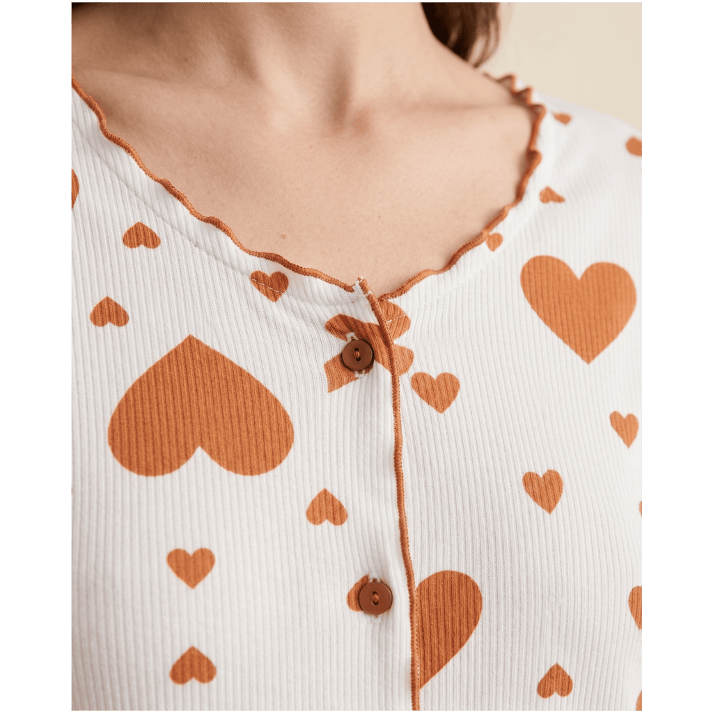 Ensemble pyjama femme coeurs en coton – Confort Douillet & Style UniqueEnsemble pyjama femme coeurs en coton doux et confortable, parfait pour vos nuits. Découvrez notre collection et craquez pour le style et la qualité.