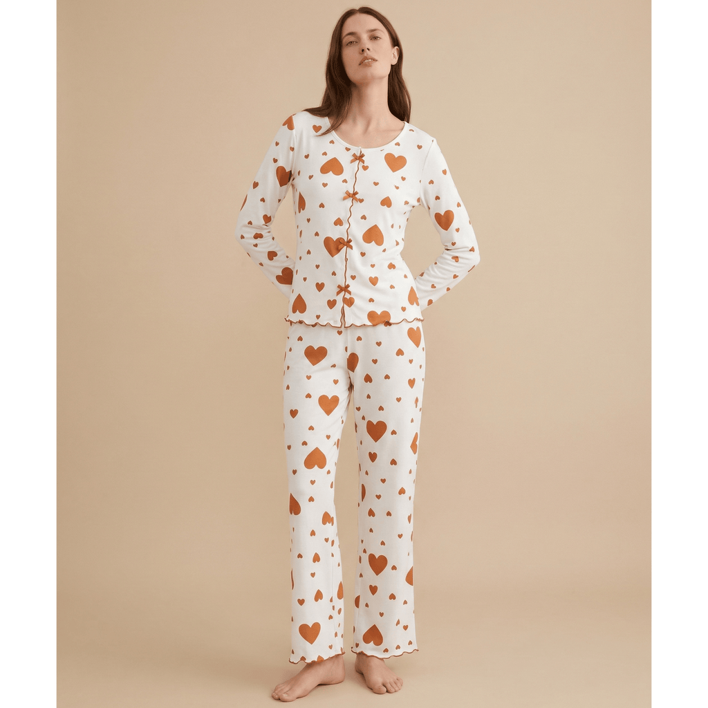 Ensemble pyjama femme coeurs en coton – Confort Douillet & Style UniqueEnsemble pyjama femme coeurs en coton doux et confortable, parfait pour vos nuits. Découvrez notre collection et craquez pour le style et la qualité.